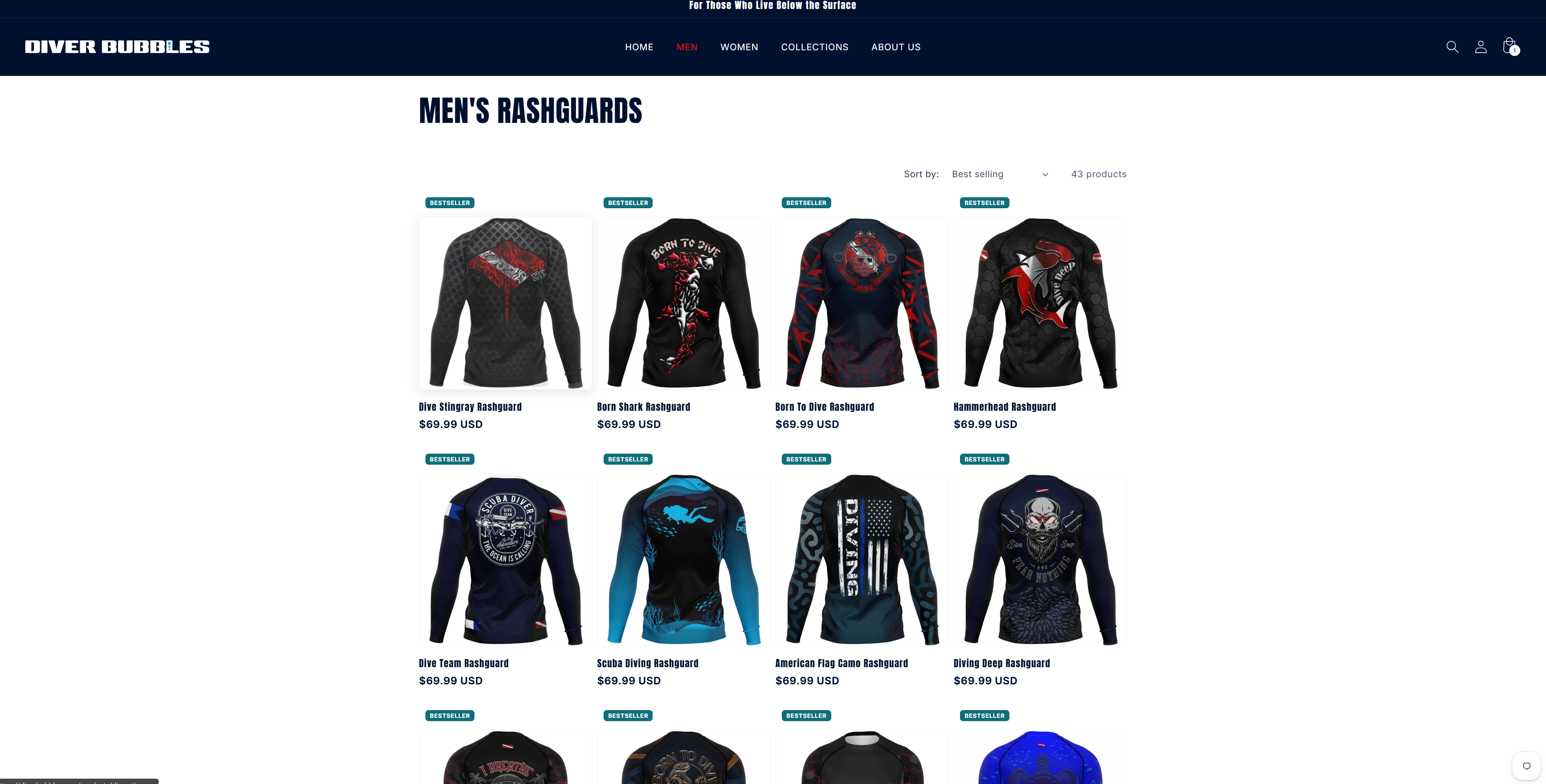 The men's rashguard collection: forty-three products in a four-column grid, each carrying a different all-over print — a stingray, a shark tearing through the fabric, a hammerhead, a flag, a bearded skull.
